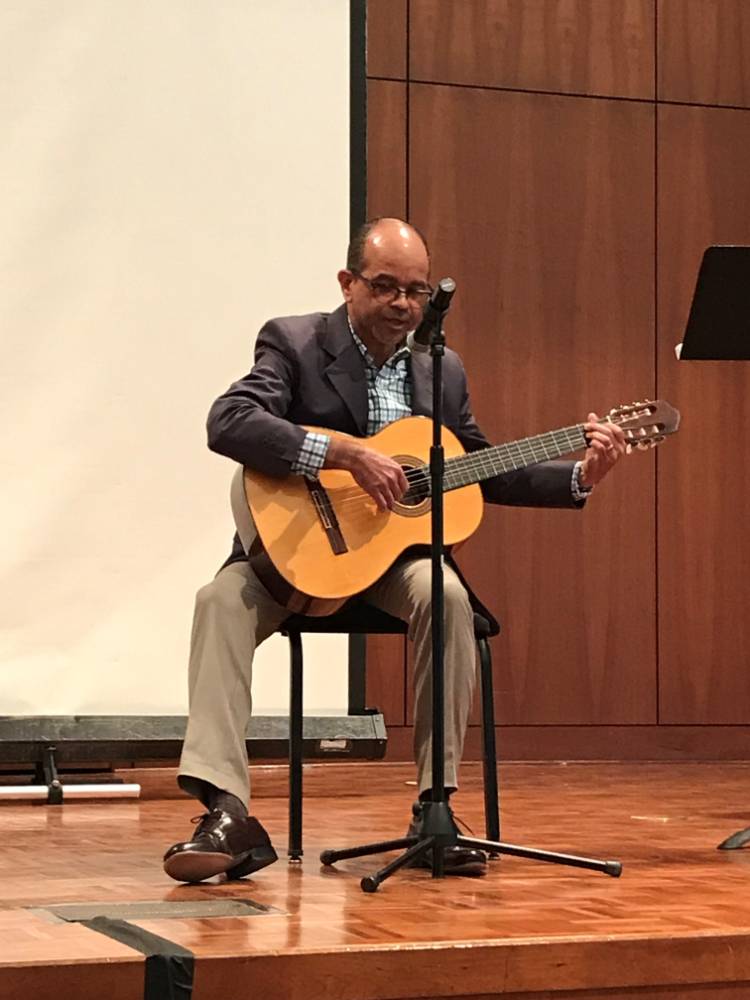 Professor Serrata on stage for the International Water Poetry and Song Celebration